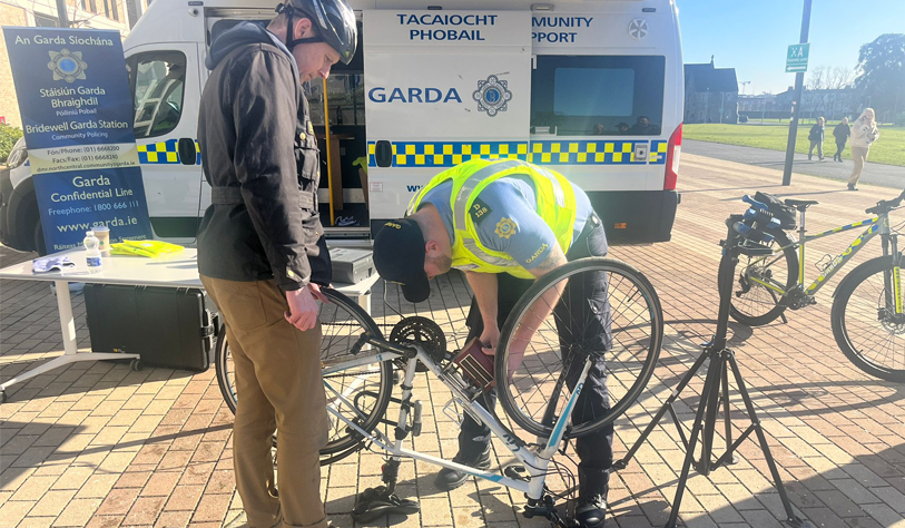 Garda marking a cyclists bike outside