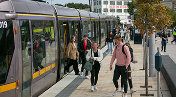 Luas TU Dublin students disembarking tram