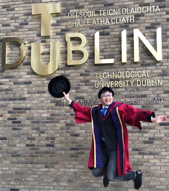 Student jumping for joy after graduating