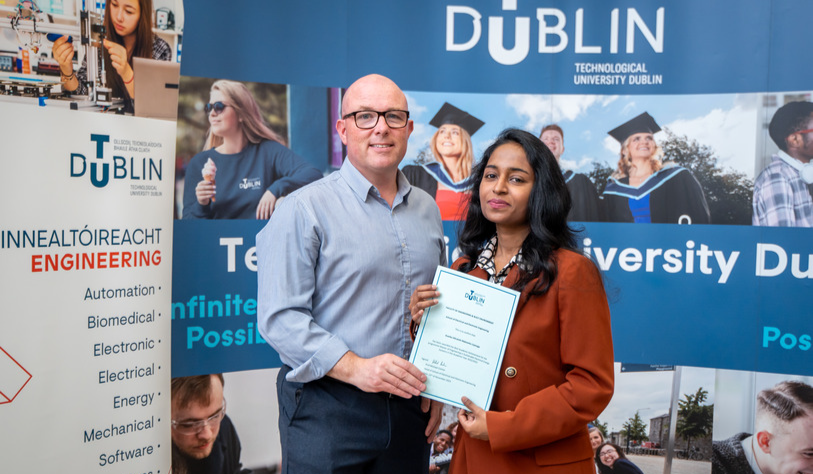 Student receiving award