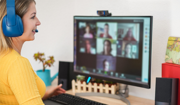 Student talking on a webinar on her computer