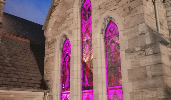 Purple light at night on Grangegorman building