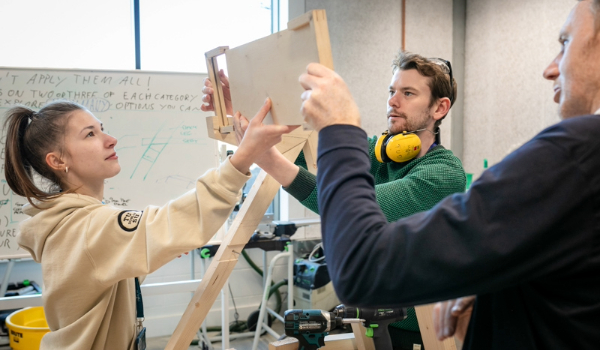 TU Dublin students and staff working together in a product design workshop