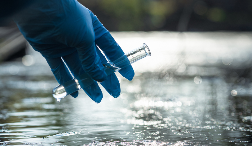 test tube collecting water sample