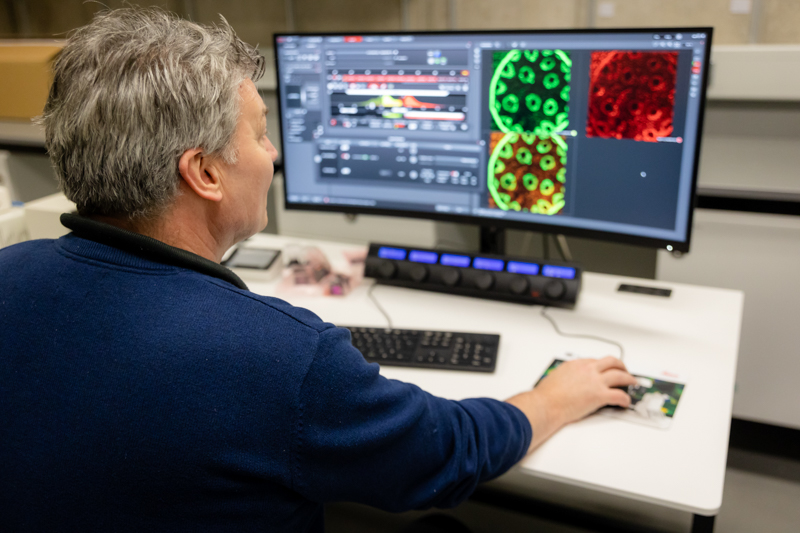 Prof. Hugh J. Byrne working on Leica Multimodal Imaging Platform